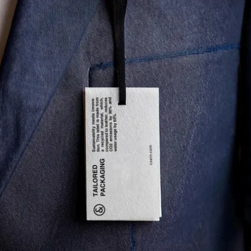 Cartellino sostenibile CO&IN in materiale riciclato per il settore fashion