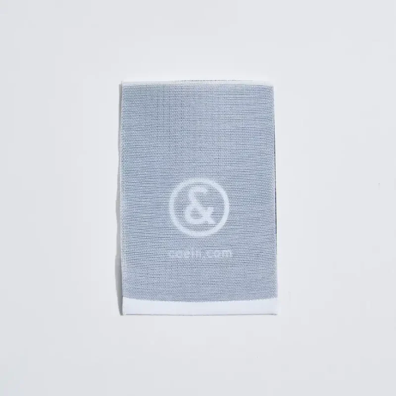 Etichetta a cavallotto tessuta cangiante