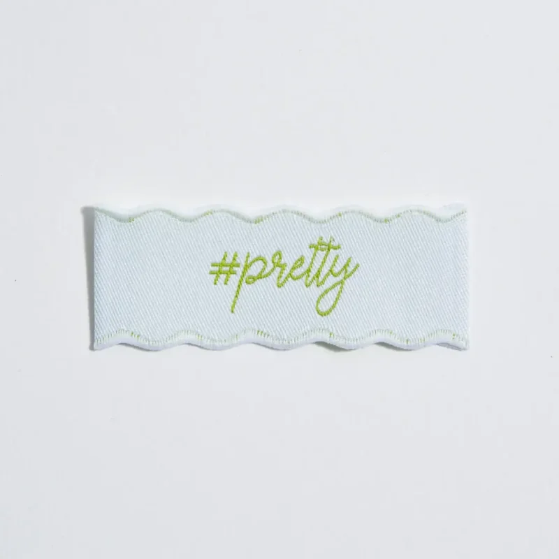 Etichetta a navetta con cimose ondulate speciali