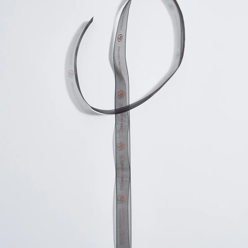 nastro-tessuto-semitrasparente-con-scritta-arancione